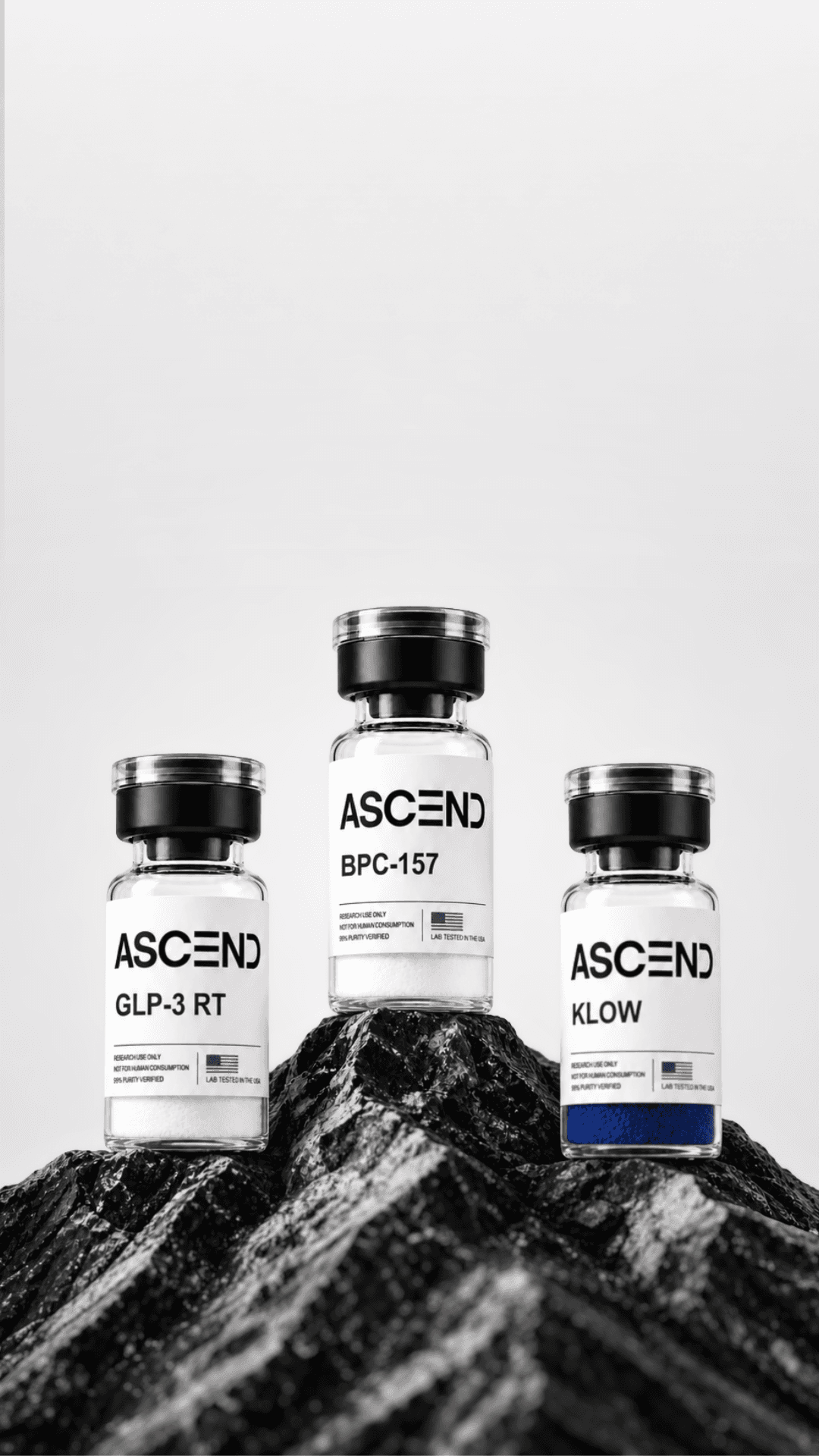 Ascend Research vials on a basalt summit, labelled for laboratory research use only