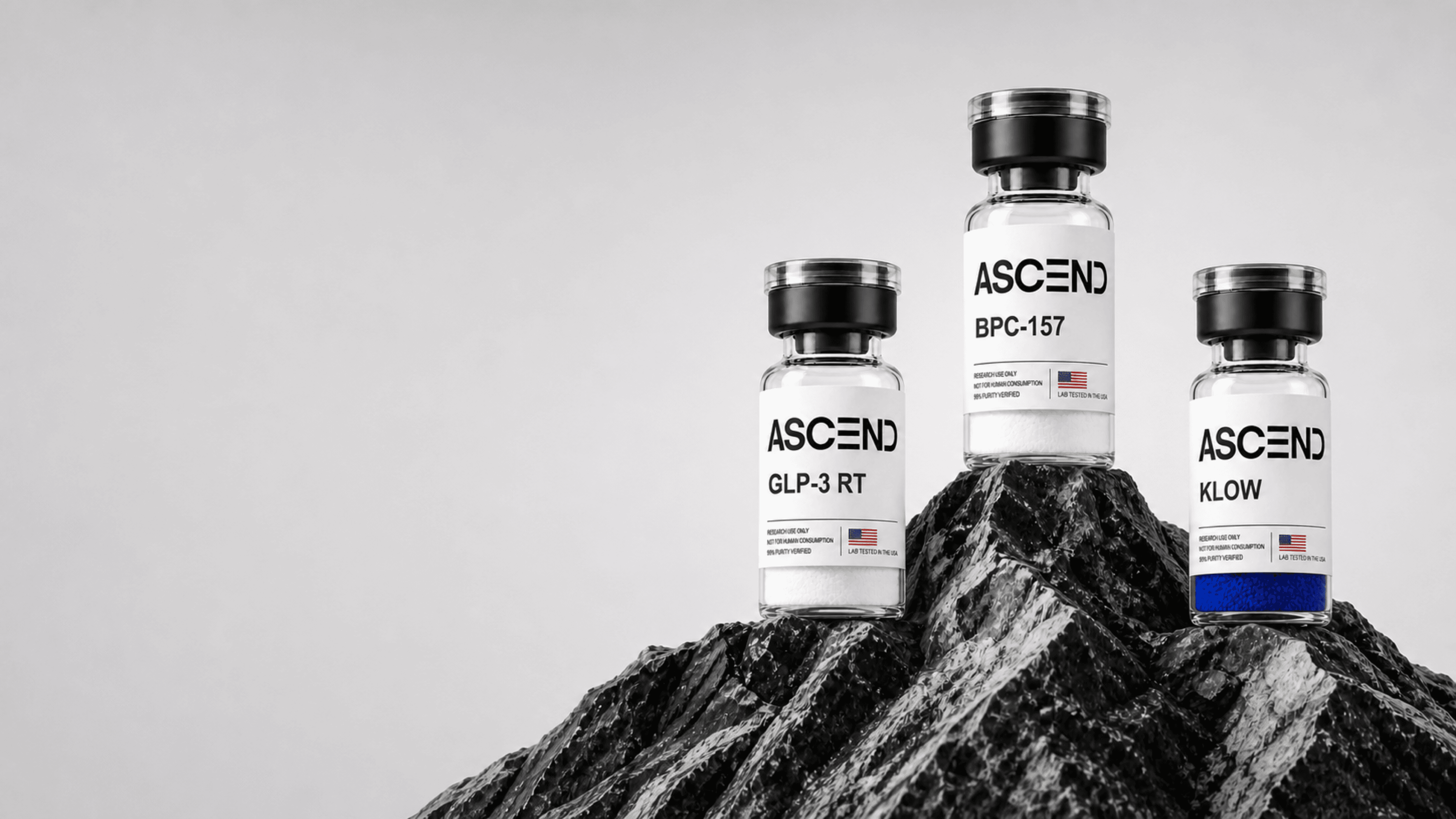 Ascend Research vials on a basalt summit, labelled for laboratory research use only